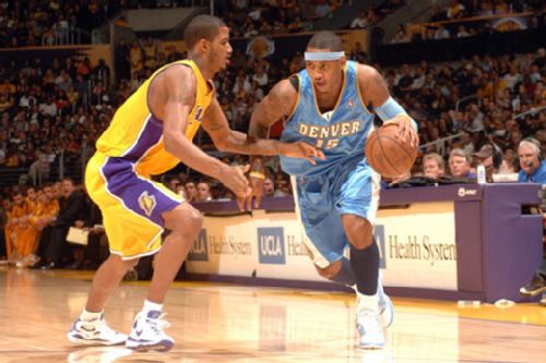 约基奇三双引领，掘金主场以 127-117击退雄鹿